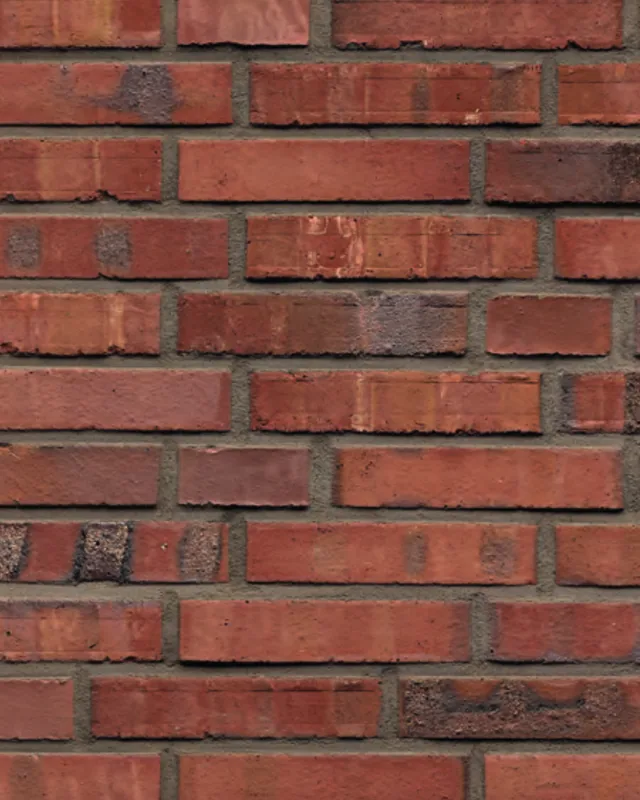 Mauerwerk aus BrandZwei Rot mit lebendigem Farbspiel und grauer Fuge